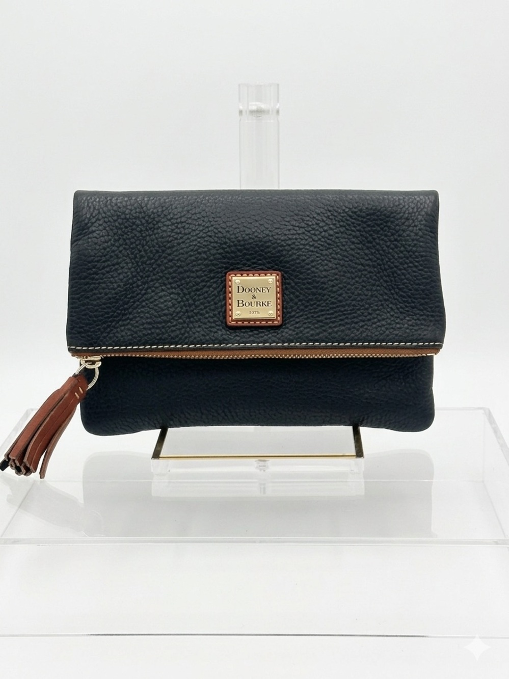Dooney & Bourke Black Fold-Over Pebbled Leather Crossbody Bag with Brown Tassel